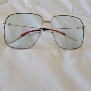 Gucci sunglasses with light blue lenses
